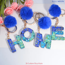 A-Z Sequin Filled Resin Initials Keychain with Blue Pompom